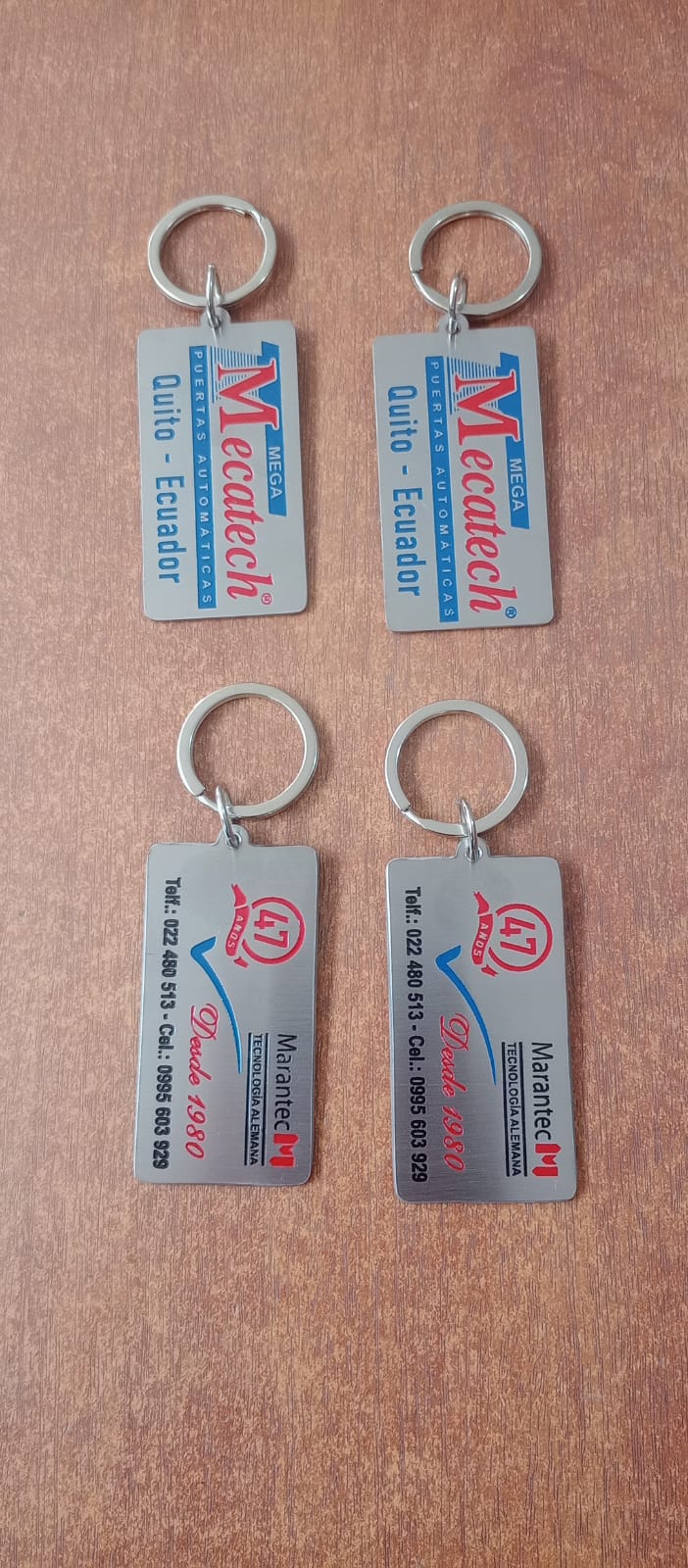 Llaveros metálicos publicitarios Mecatech y Marantec